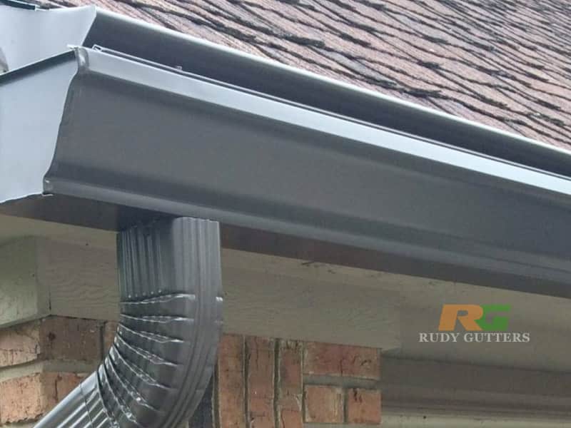 Gutter cover / gutter guard installed on a roofline